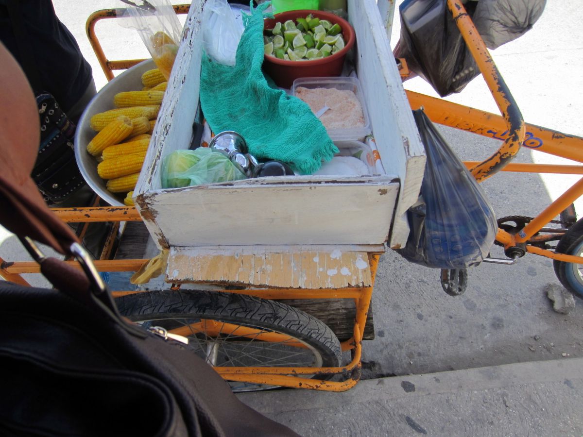 Boiled Corn vender.  Salt and Lime optional.