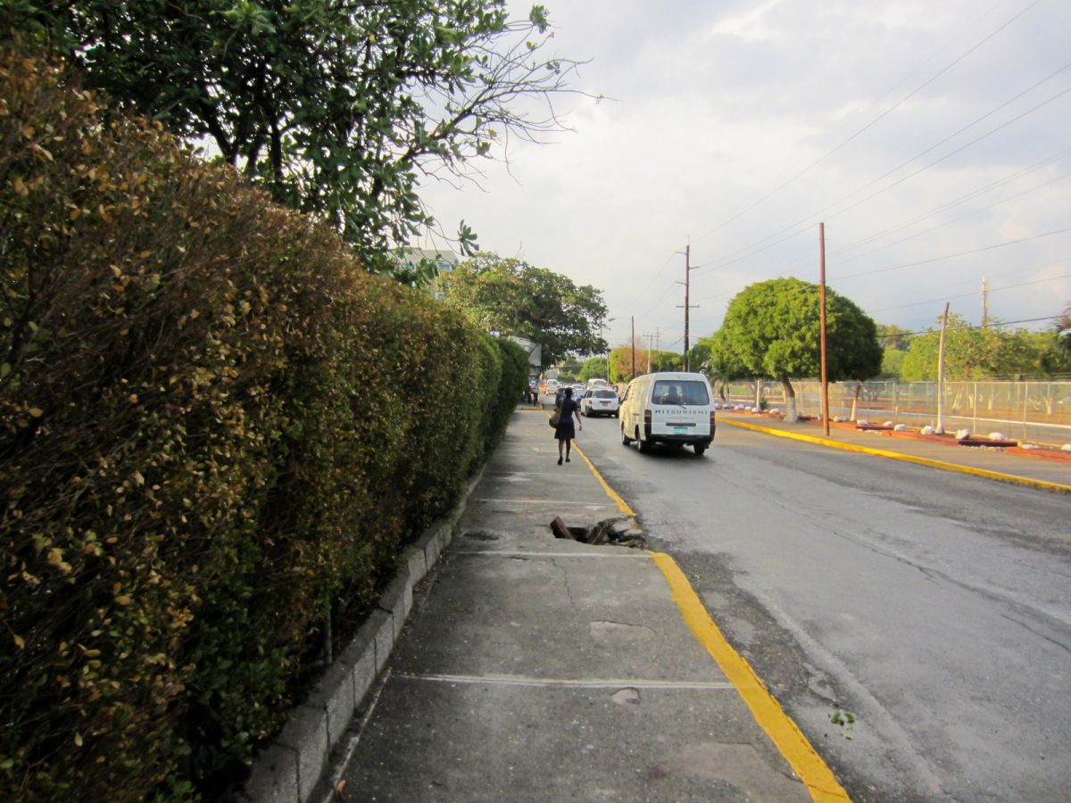 There is a pothole in every sidewalk.  I think it is probably fixed by now.